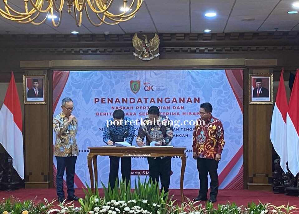 Wagub Kalteng bersama Ketua Dewan Komisioner OJK RI Tandatangani NPHD BAST Barang Milik Pemprov